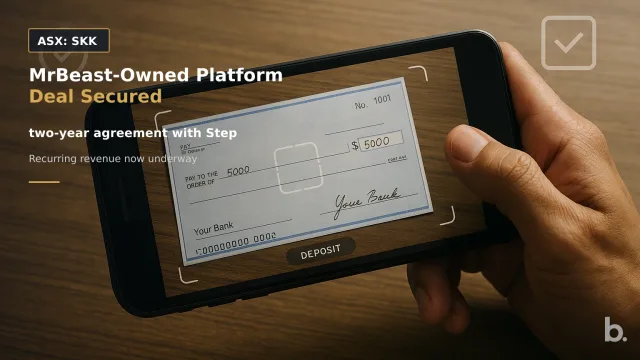 [ASX: SKK] STAKK LIMITED a smartphone held above a paper cheque during a mobile deposit, with the camera interface framing the cheque